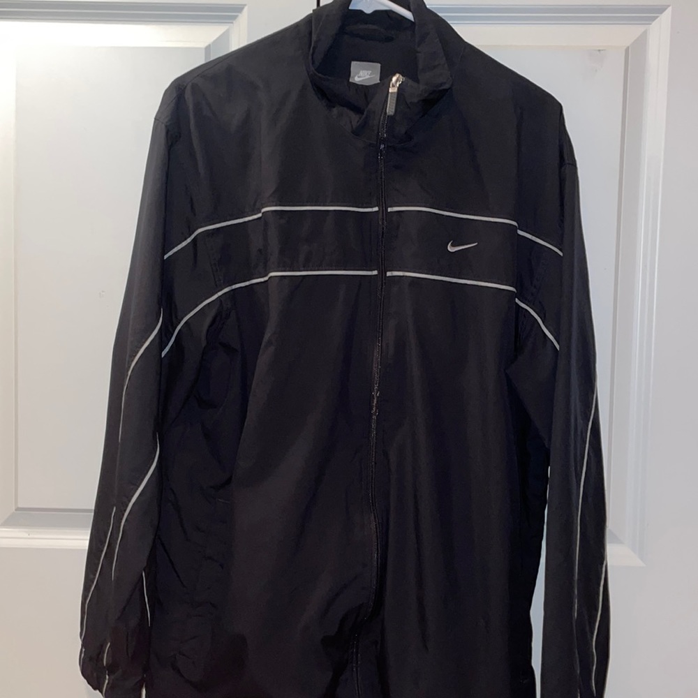 Black Nike wind beaker.